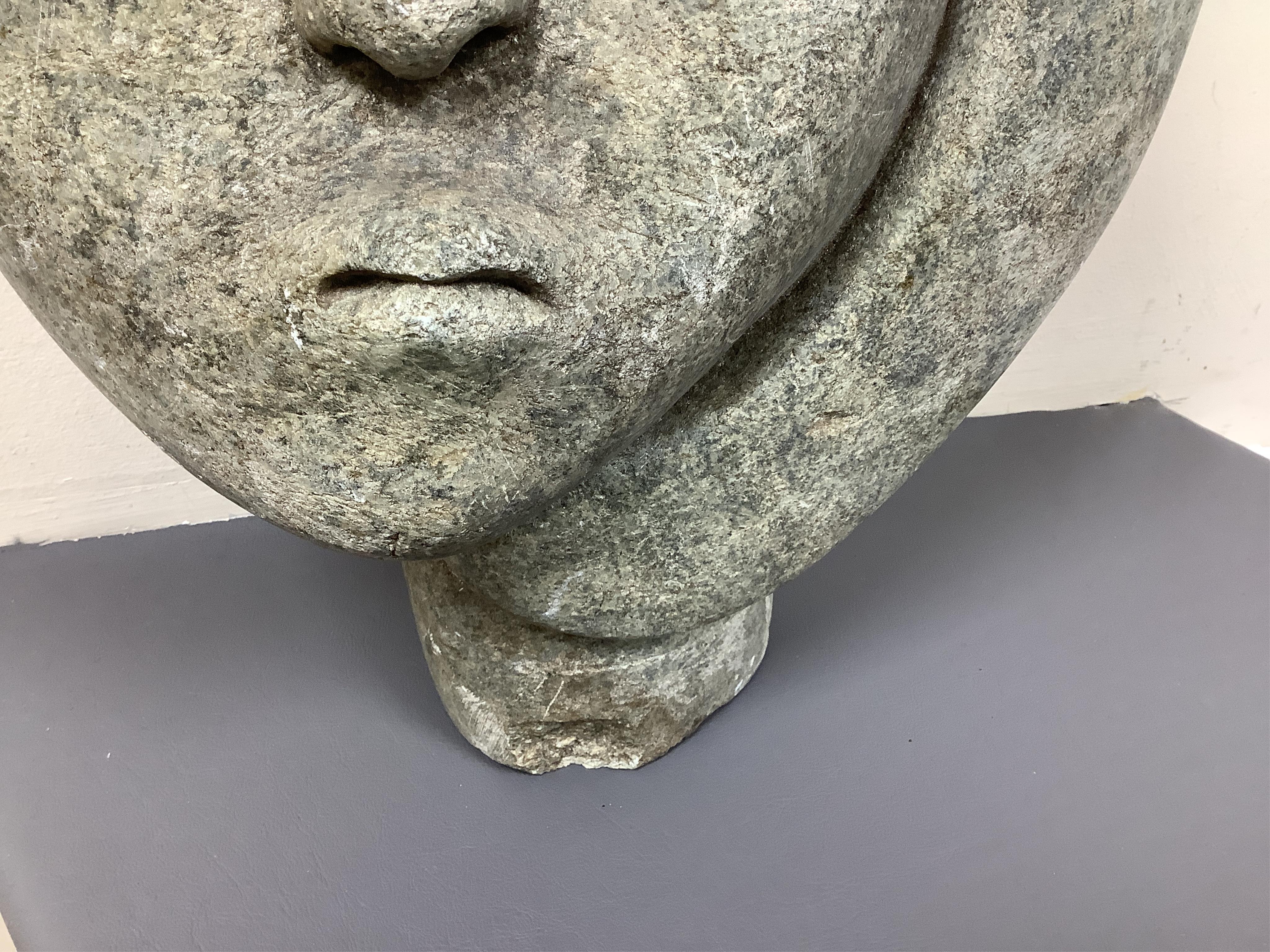 Style of Josia Manzi - a carved serpentine stone head, 37cm